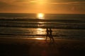 Running along the beach with sunrise Royalty Free Stock Photo