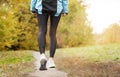 Running along a park path, healthcare and problem concept - close-up of an unhappy person suffering from pain in the leg or knee Royalty Free Stock Photo