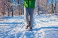 Running athlete man sprinting in winter forest. Training outside in cold snowy weather. Active healthy way of life Royalty Free Stock Photo