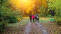 Running athletes in the park on a run in the early morning. Several children are running in the woods doing sports Royalty Free Stock Photo