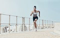 Running, black woman and beach marathon training, fitness and wellness for sports goals, body motivation and energy Royalty Free Stock Photo