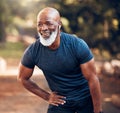 Running, break and black man breathing for fitness, exercise and workout in nature, park or garden. Senior male, sports Royalty Free Stock Photo