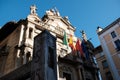 Running bulls barrier Pamplona, city hall on the background Royalty Free Stock Photo