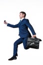 Running businessman with briefcase and phone, isolated on white background Royalty Free Stock Photo