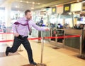 Running businessman in a hurry Royalty Free Stock Photo