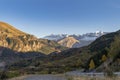 Running car on a curve road with snowcap mountain range near boarder of Spain & French Royalty Free Stock Photo