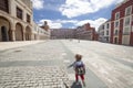 Running child at Upper Square of Badajoz, Extremadura, Spain