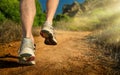 Running, closeup of the runner`s feet