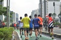 running and cycling on the streets of Jakarta City on Car Free Day