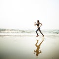 Running Exercise Training Healthy Lifestyle Beach Concept Royalty Free Stock Photo