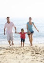 Running Family On Beach Holiday Royalty Free Stock Photo