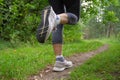 Running feet and trail Royalty Free Stock Photo