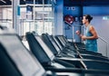 Running, fitness and man exercise on treadmill in gym workout, training or healthy cardio health, wellness and energy Royalty Free Stock Photo