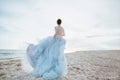 Running bride on the beach Royalty Free Stock Photo