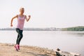 Running girl on the beach