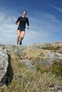 Running girl in shorts outdoor