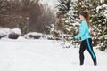 Running girl wearing sportswear, winter fitness Royalty Free Stock Photo