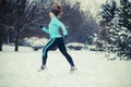 Running girl wearing sportswear, winter fitness Royalty Free Stock Photo