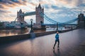 Running in London. Man train near by Tower Bridge, London, England Royalty Free Stock Photo