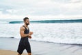 Running Man Jogging At Beach During Fitness Workout Outdoor. Sport Royalty Free Stock Photo