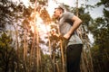 Running man. Male runner jogging at the park. Guy training outdoors. Exercising on forest path. Healthy lifestyle Royalty Free Stock Photo