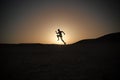 Running man silhouette at sunset sky Royalty Free Stock Photo