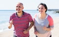 Running mature couple Royalty Free Stock Photo