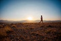 Running in the mountains.running athlete on the background of mountain peaks. Skyrunning. A person trains outdoors, leads an Royalty Free Stock Photo