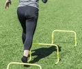 Running over mini hurdles from behind Royalty Free Stock Photo