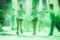 Running people at a color run in Cologne