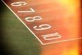 Running race track number screen on ground surface