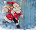 Running Santa Claus. Soft toy. Royalty Free Stock Photo