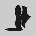 Running shoe symbol on gray backdrop Royalty Free Stock Photo