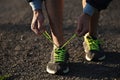 Running shoes being tied by man getting ready for jogging. Royalty Free Stock Photo