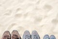 Running shoes family, the top view of the sand, vacation and holidays Royalty Free Stock Photo