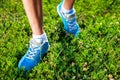 Running shoes on grass.
