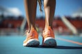 Running, shoes and start with a sports woman or female runner on a track for a workout, exercise or training