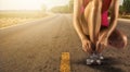 Running shoes - woman tying shoe laces. Closeup of female sport fitness runner Royalty Free Stock Photo