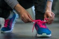 Running shoes - woman tying shoe laces. Woman getting ready for Royalty Free Stock Photo
