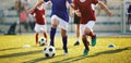 Running Soccer Football Players. Footballers Kicking Football Game on Training Unit Royalty Free Stock Photo