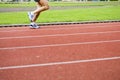 Running on sports-ground Royalty Free Stock Photo