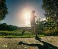 Running sportsman freeze within quick moment in front of camera