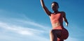 Running, start and black woman on a blue sky for fitness, training and sports energy with mockup space. Motivation