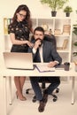 Running startup business together. Confident businessman and sexy woman working in startup company. Startup project Royalty Free Stock Photo