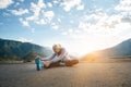 Running stretching. Athlete at the top of the mountain. Royalty Free Stock Photo