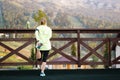 Running stretching runner doing warm-up before the marathon. Royalty Free Stock Photo