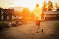 Running stretching runner doing warm-up before the marathon. Royalty Free Stock Photo