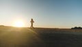 Running after sun. Young Asian women are exercising with outdoor running with a mountain background. When sun sets in