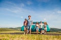 Running teenage couples in love outside against blue sky Royalty Free Stock Photo