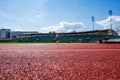 running track for athletic competition, training, exercise in stadium in summer Royalty Free Stock Photo